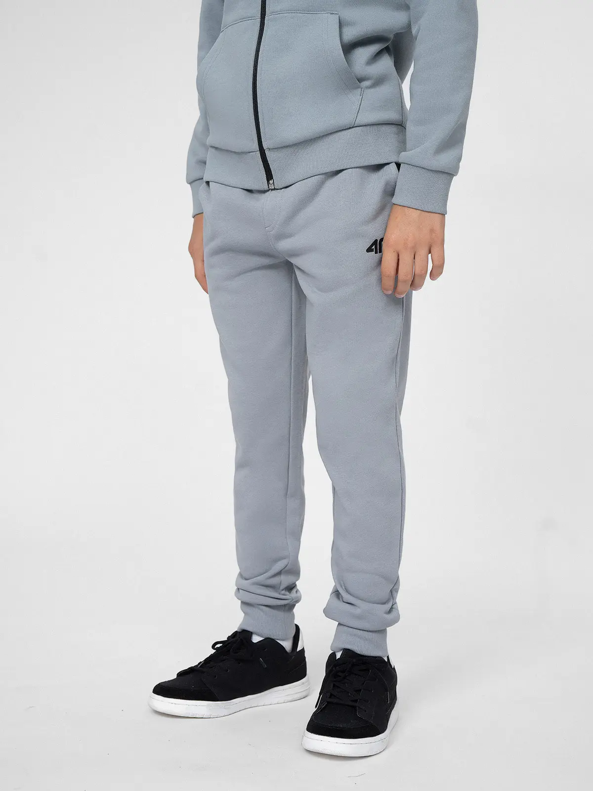 4F 4FJSS23TTROM131 LIGHT BLUE Dětské tepláky EU