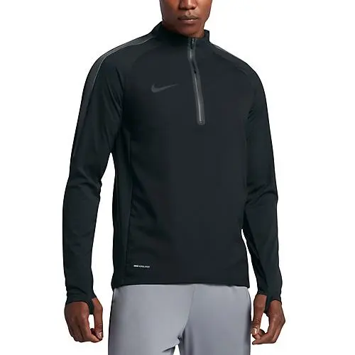 Nike Aerolayer Repel Strike Drill pánské fotbalové triko Aerolayer Repel Strike Drill s 1/4 zipem dlouhým rukávem a otvory pro palec od značky Nike, různá barevná provedení.