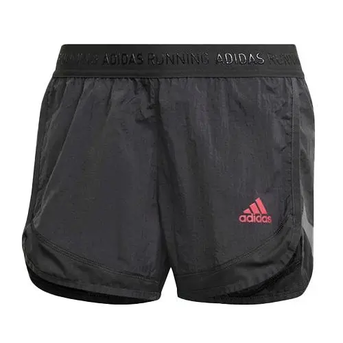 Dámské šortky Adidas Ultra - Dámské sportovní kraťasy Ultra s vnitřními spodními šortkami od značky Adidas, černé provedení s růžovým dateilem.