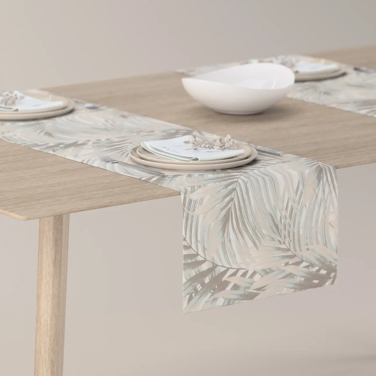 Dekoria Stolní běhoun, béžovo-krémové palmové listy bílém podkladu, 40 x 130 cm, Gardenia, 142-14