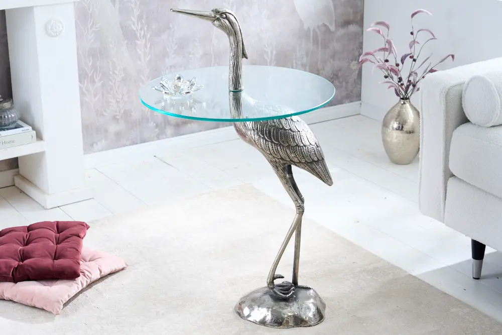 Estila Designový kulatý příruční stolek Ardea se skulpturální podstavou ve tvaru volavky ve stříbrné barvě 88 cm