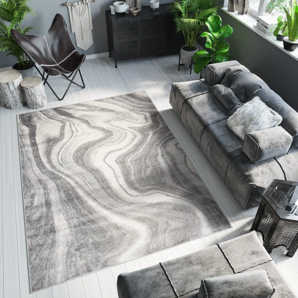Světle šedý designový koberec s abstraktním vzorem Šířka:
