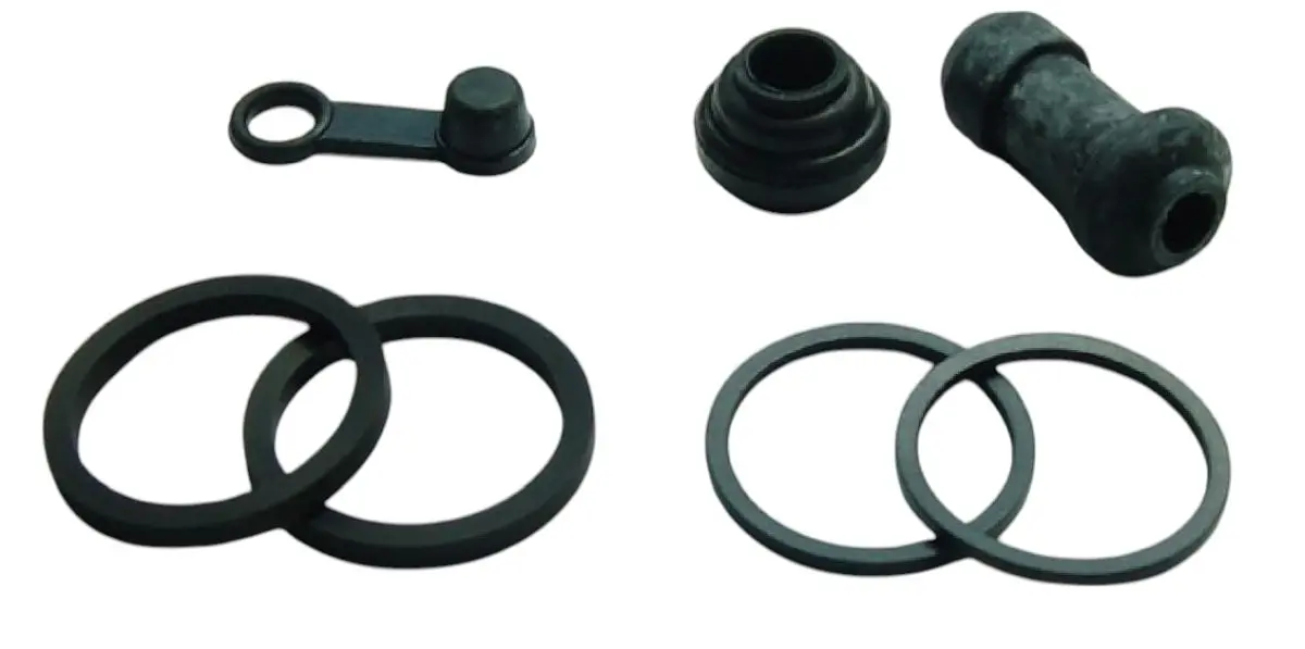 TOURMAX opravná sada brzdového třmenu přední KAWASAKI KX 125 94-05, KX 250 87-90 vyrobeno v Japonsku (TOURMAX opravná sada brzdového třmenu přední)