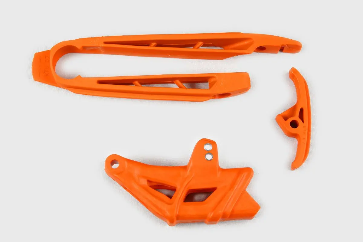 UFO komplet kluzák (malý i velký) + vodítko řetězu KTM SX 125/144/150/250, SX-F 250/450 07-10, EXC 125/200/250/300, EXC-F 250/450 08-10, barva