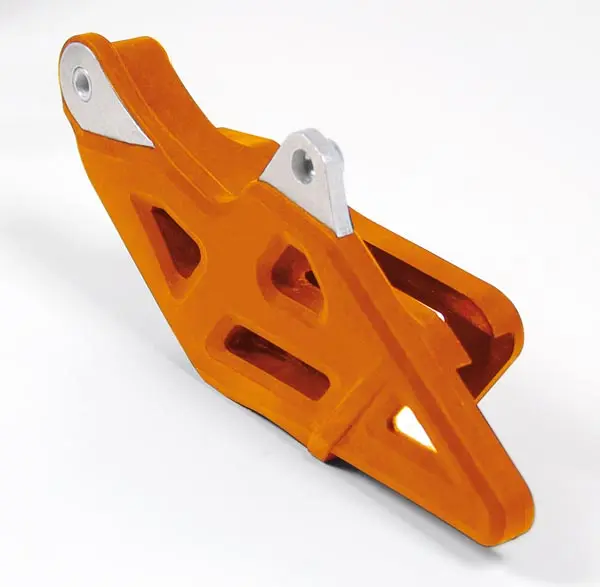 RACETECH (RTECH) vodítko řetězu KTM SX/SXF 125/150/250/350/450 08-22, HUSQVARNA TC/FC 125/250/350/450 15-22, GAS GAS MC/EC 21-22 barva oranžová