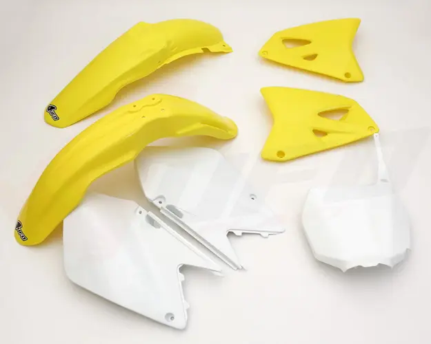 UFO kompletní sada plastů SUZUKI RM 125 / 250 06-24 barva OEM (bílá/žlutá) (SU406E999) (UFO kompletní sada plastů SUZUKI RM 125 / 250 06-24 barva OEM)