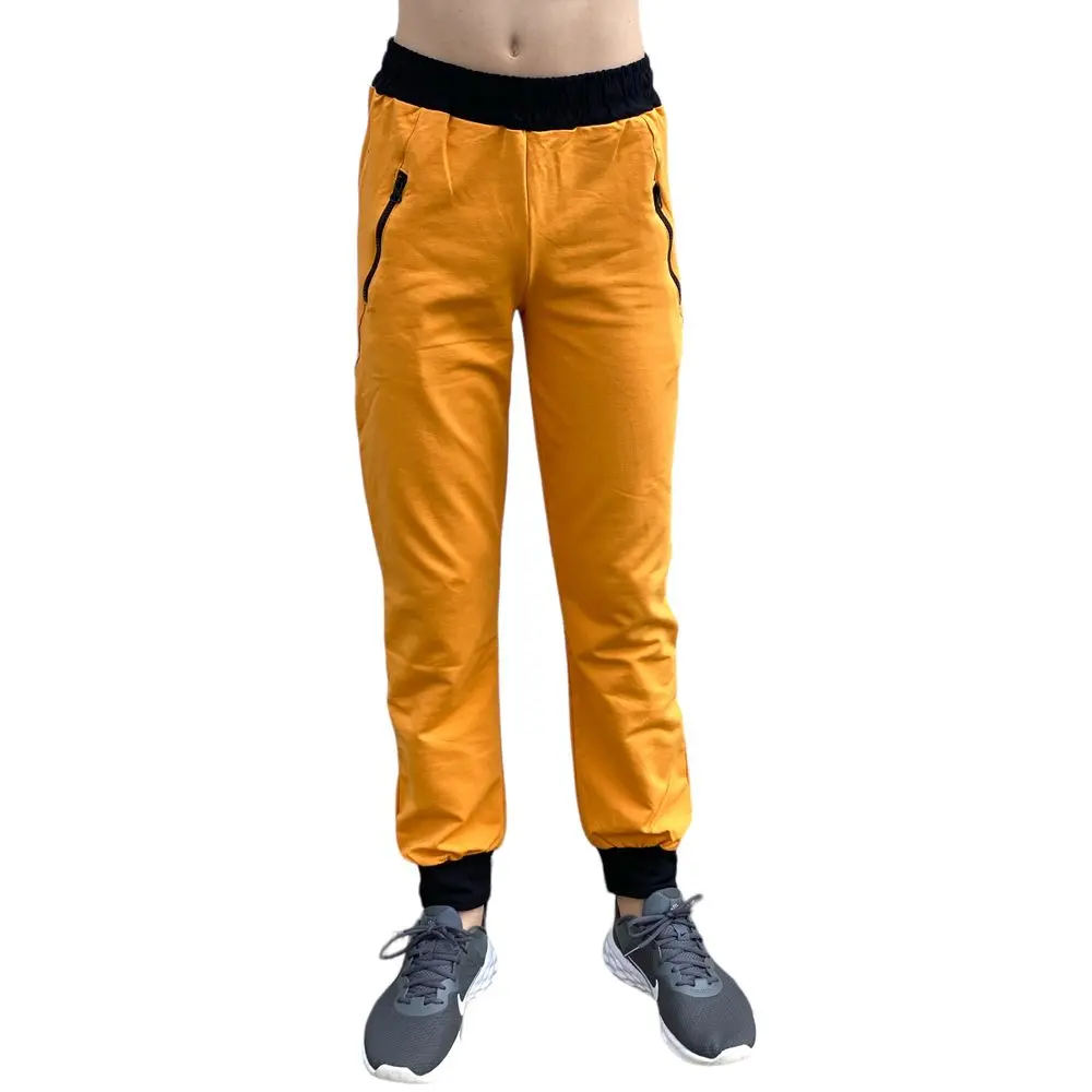 Dětské bavlněné tepláky hořčicové -
