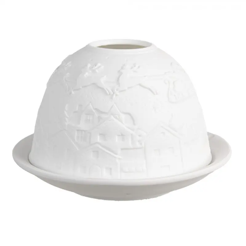 Bílý porcelánový svícen na čajovou svíčku se Santa Clausem a soby nad městečkem – 12x8 cm
