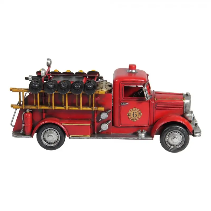 Červený kovový model hasičské auto