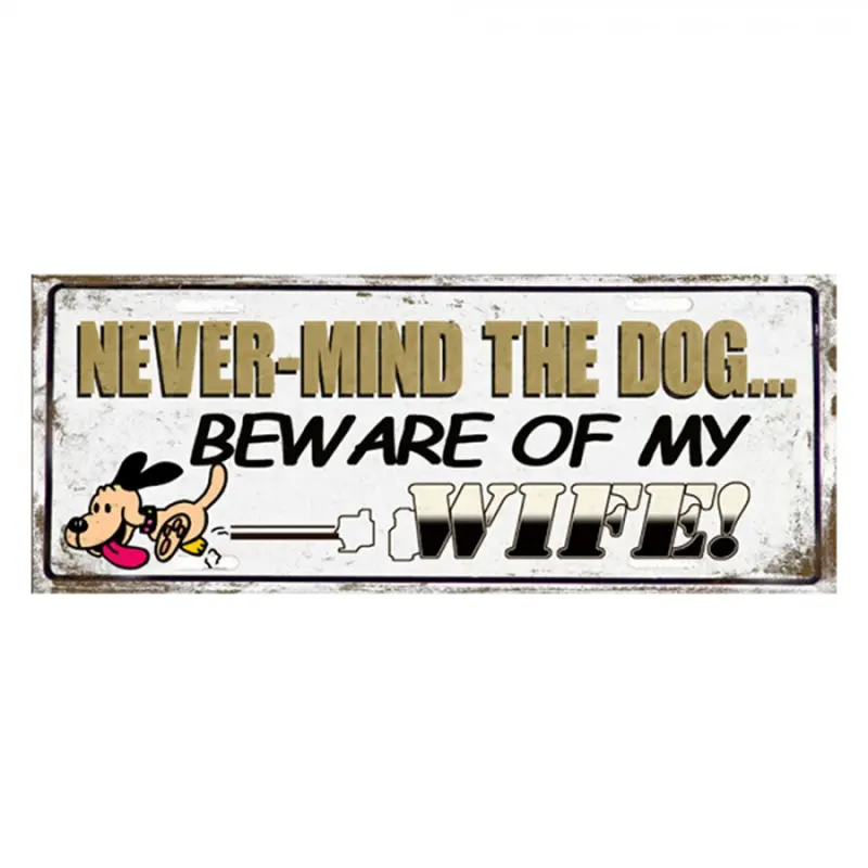 Nástěnná kovová cedule Never Mind The Dog – 50x1x20 cm