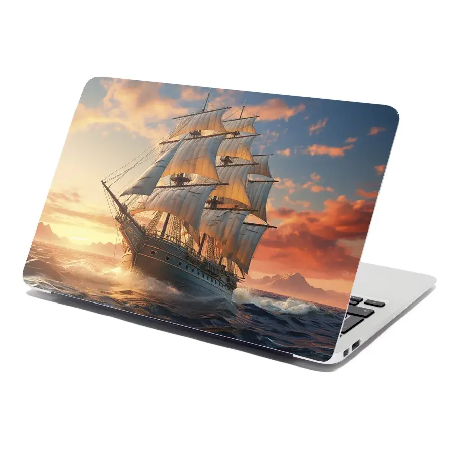 Samolepka na notebook Plachetnice ve vlnách při východu slunce - 38x26 cm