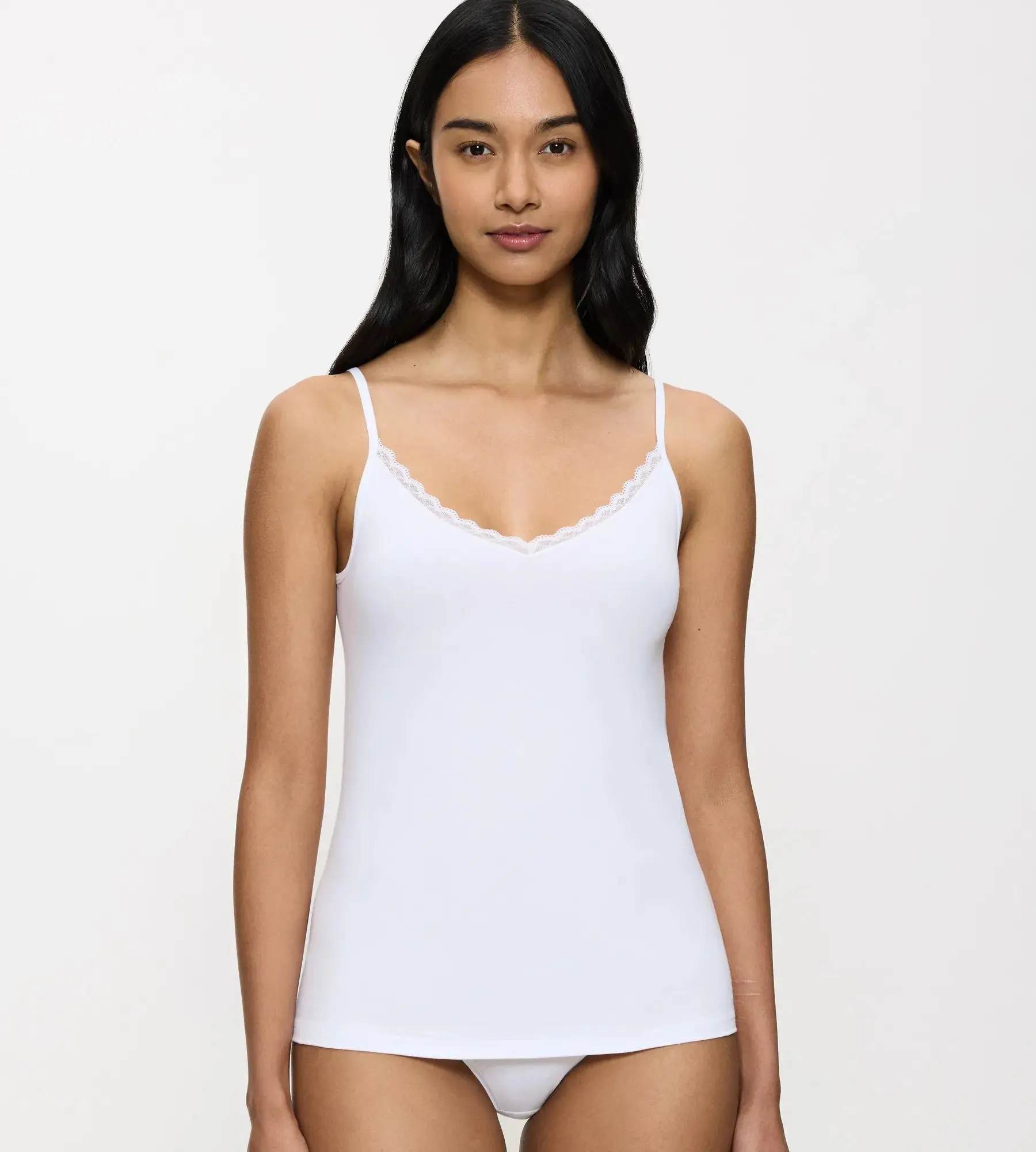 FEEL OF COTTON – Neviditelný bezešvý top z bio bavlny Triumph WHITE 38