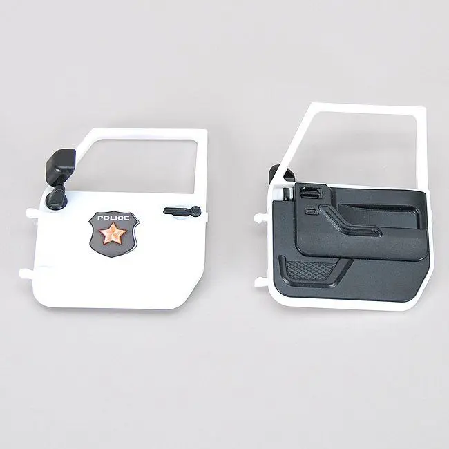 Přední dveře pro policejní Jeep Wrangler Rubicon - Bruder 42507