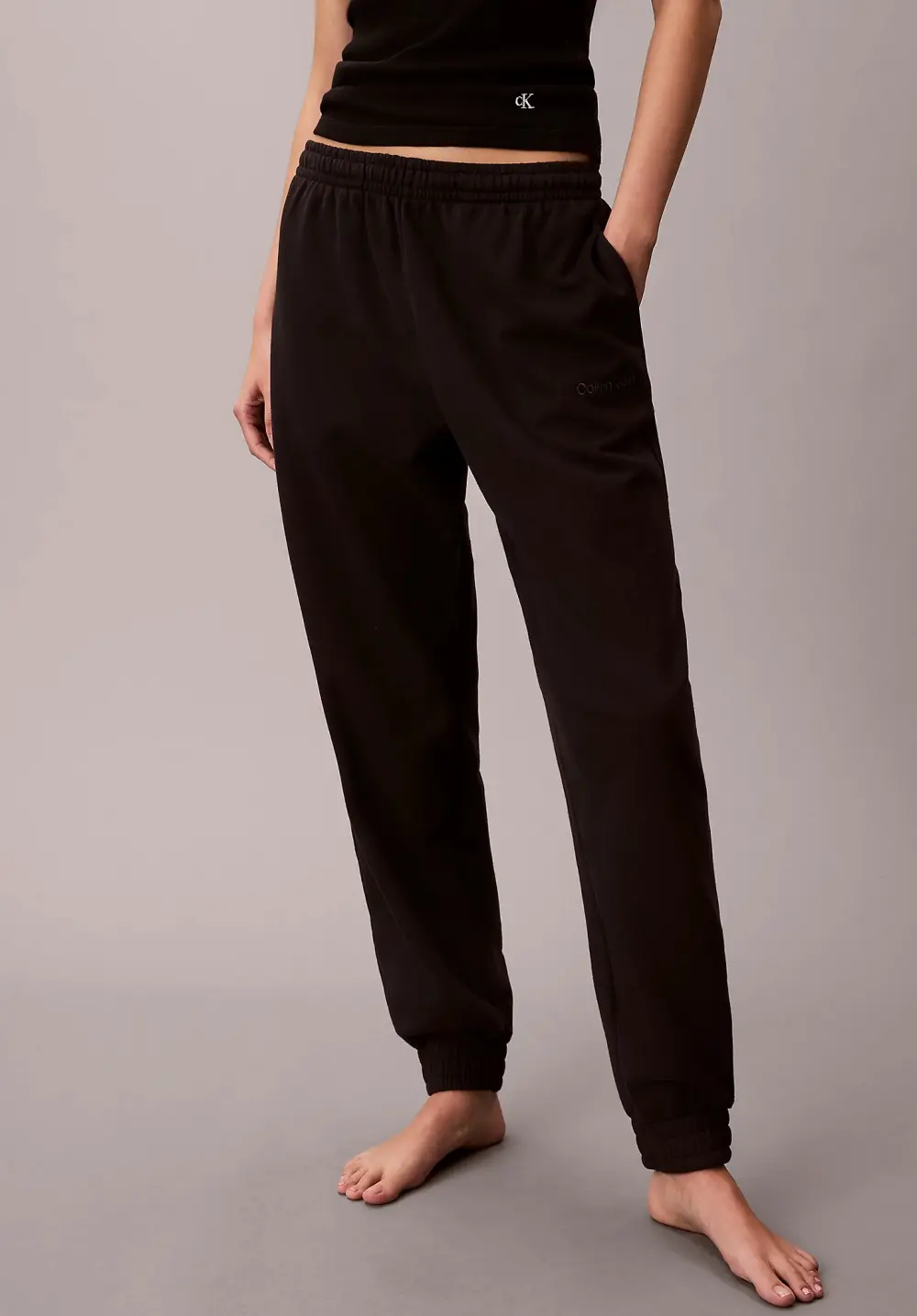 Dámské tepláky Calvin Klein QS7515