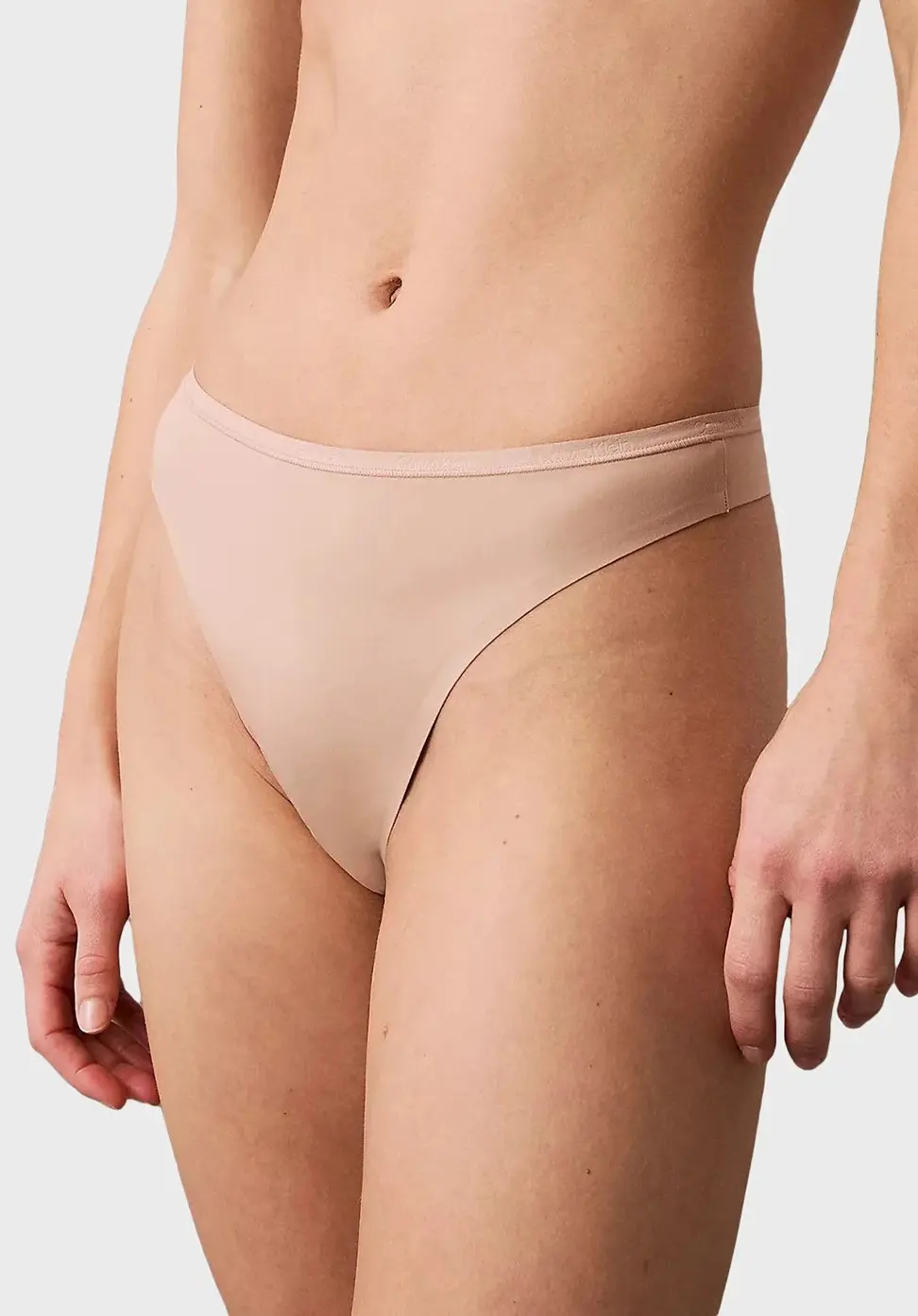 Dámská tanga Calvin Klein QF7820