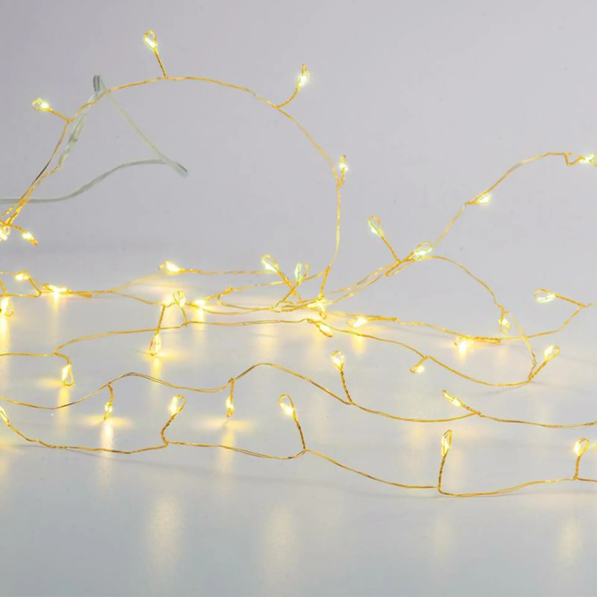 ACA Lighting 50 LED dekorační řetěz, WW, zlatý měďený kabel na baterie  3XAA IP20 2.5m+30cm, 3W X01501317