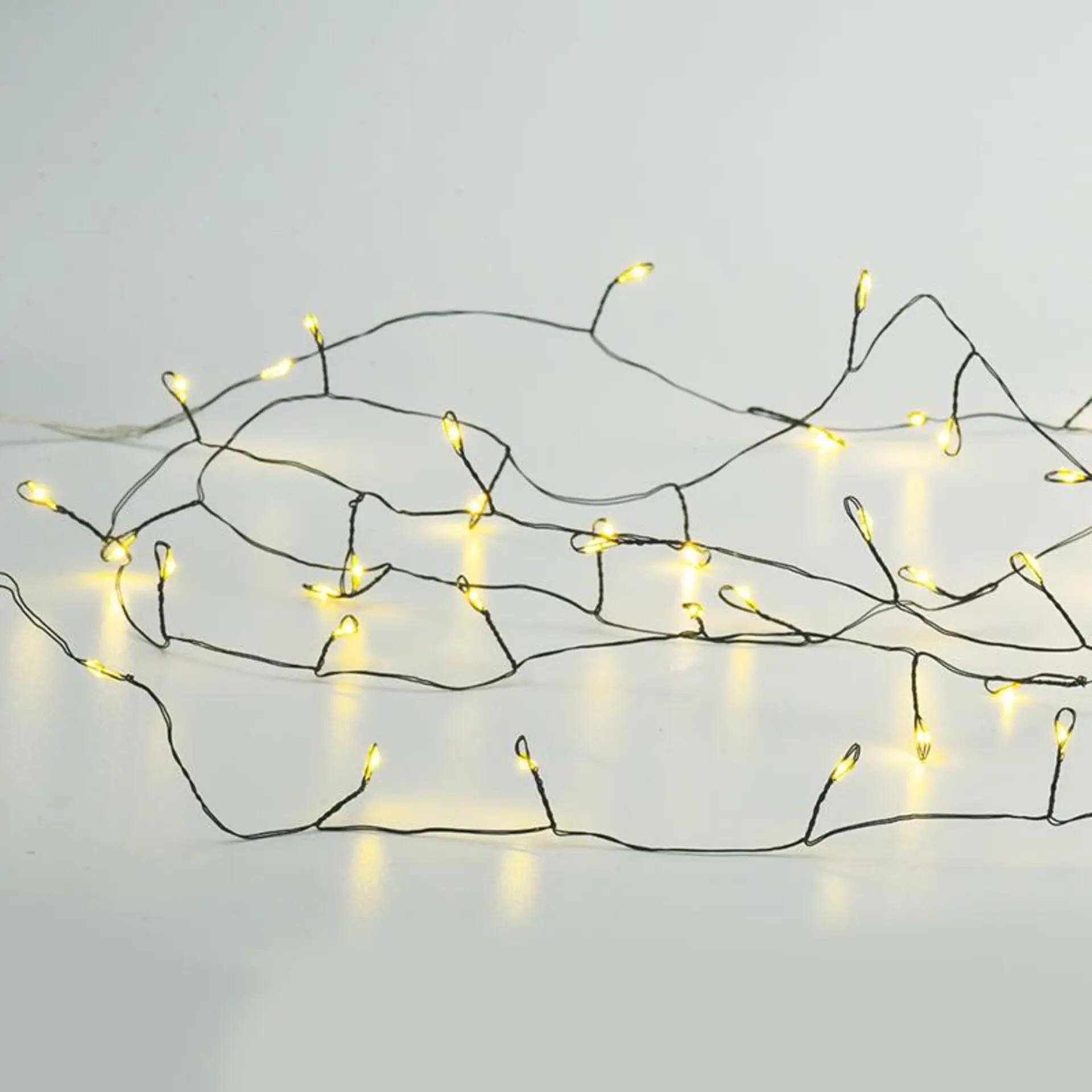 ACA Lighting 300 LED dekorační řetěz, WW, černý měďený kabel, 220-240V + 8 funkcí, IP44, 3m+3m, 6W X063001477