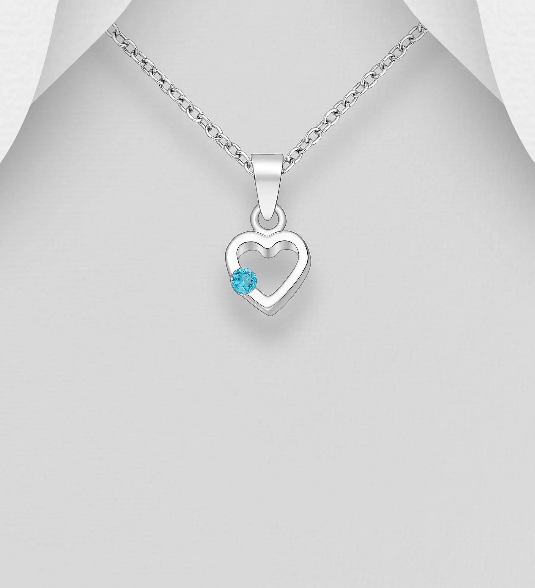 Přívěsek ze stříbra 925 se srdíčkem, zdobený imitací diamantů CZ světle modrý