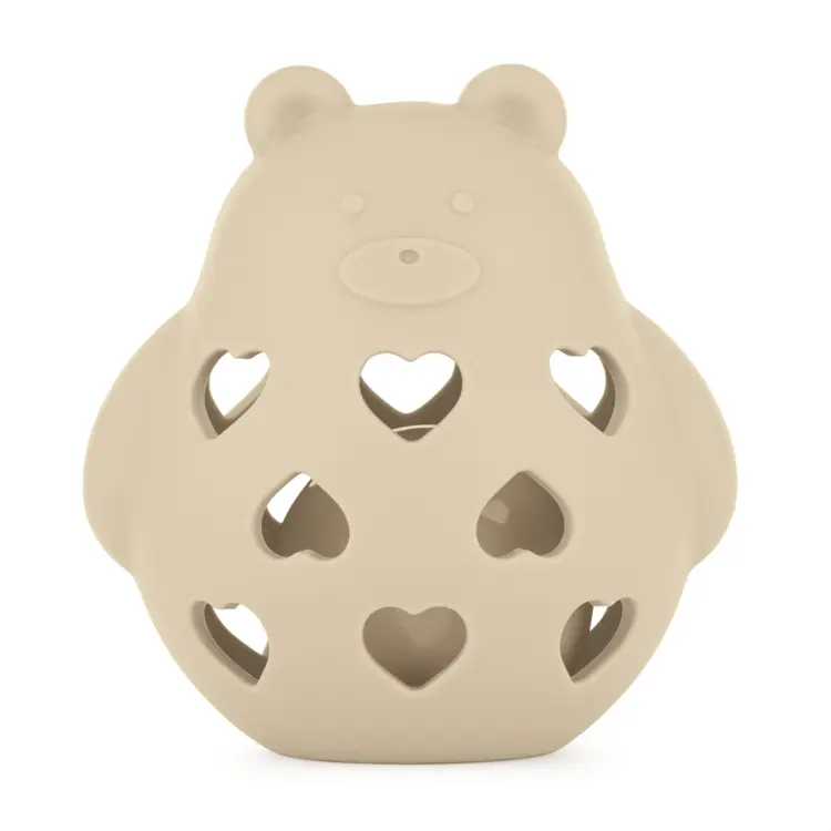 PETITE&MARS Hračka silikonová s chrastítkem bear basil desert sand 0m+