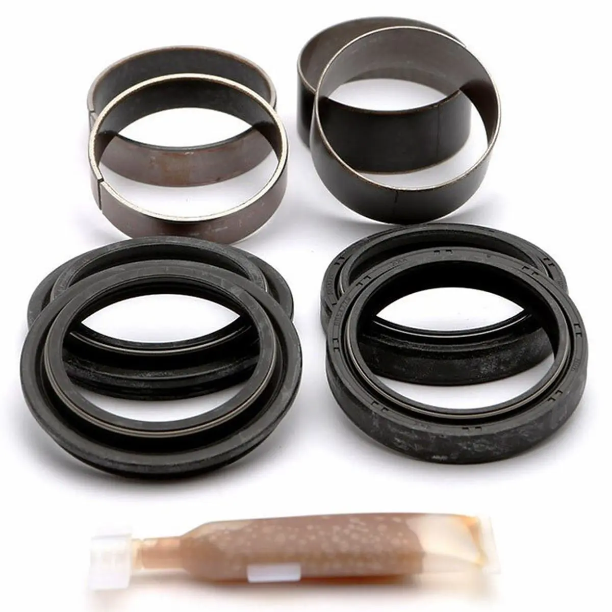 KYB opravná sada tlumiče přední (těsnění prachové 2 kusy, olejové 2 kusy, pouzdra 4 kusy, mazivo) (SERVICE KIT) (KYB opravná sada tlumiče přední)