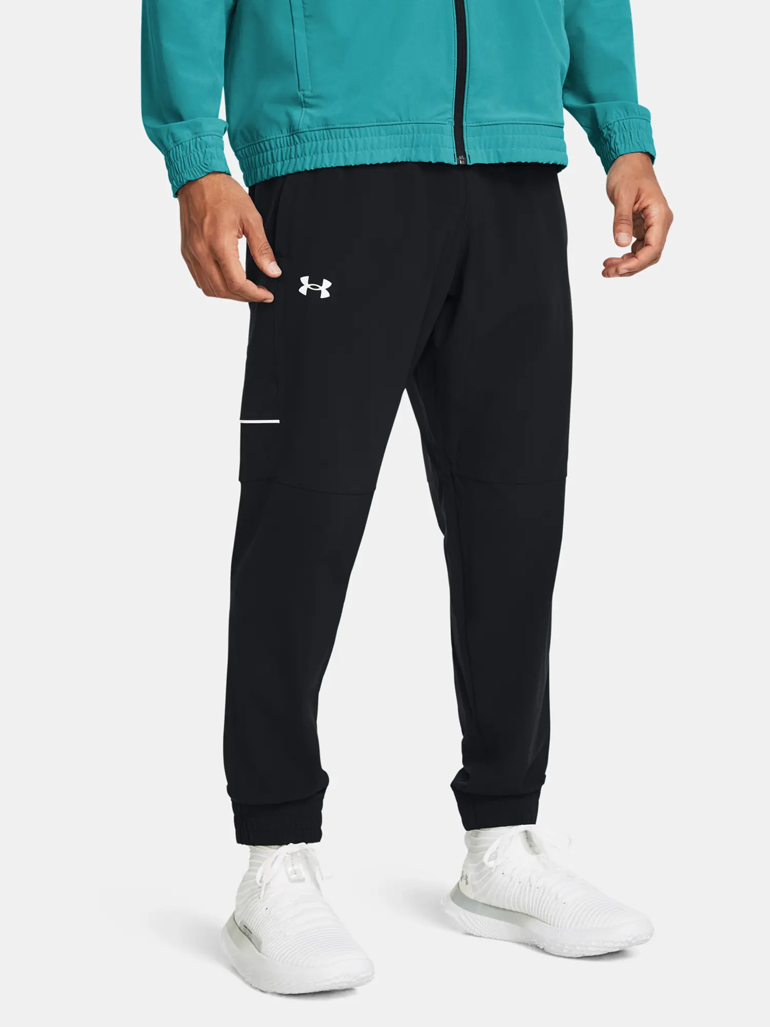 Under Armour Kalhoty UA Baseline Woven Pant-BLK - Pánské