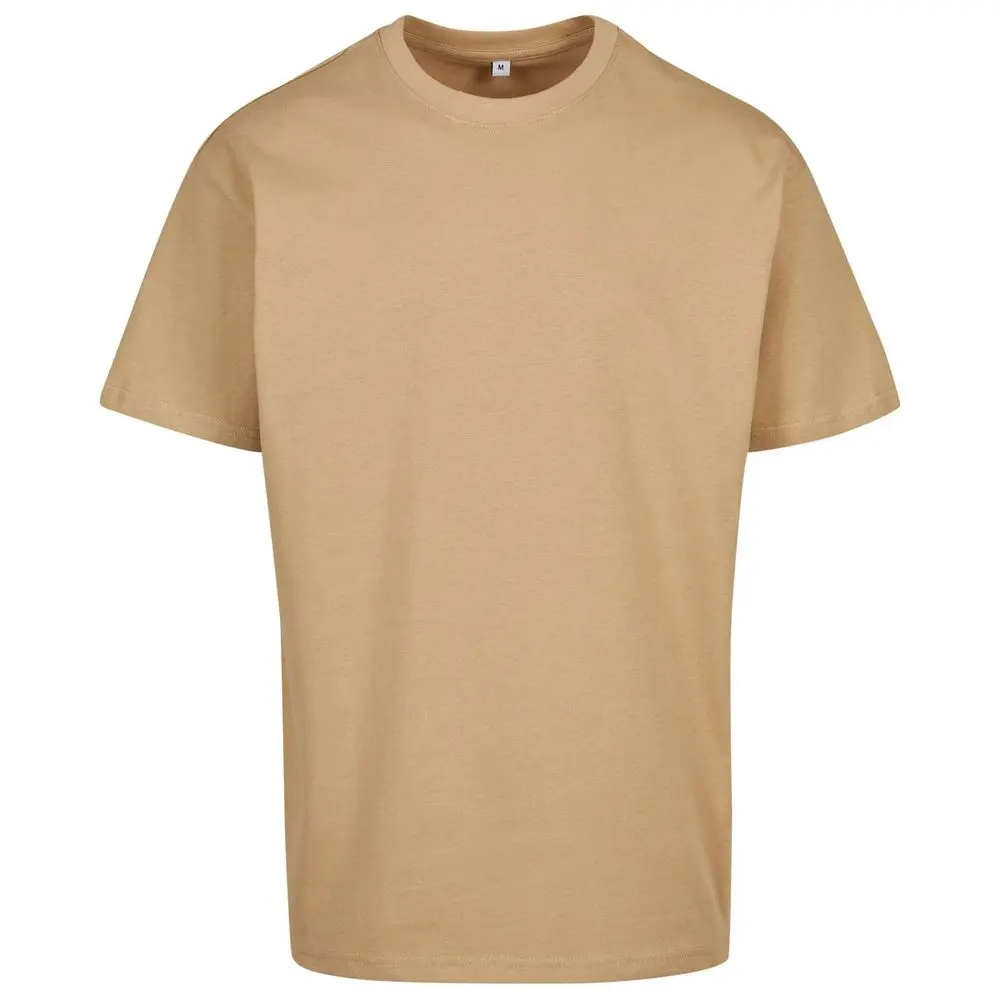 Build Your Brand Volnočasové oversize tričko z husté bavlny 240 g/m² se spadlými rameny Barva: béžová cibule, Velikost: M