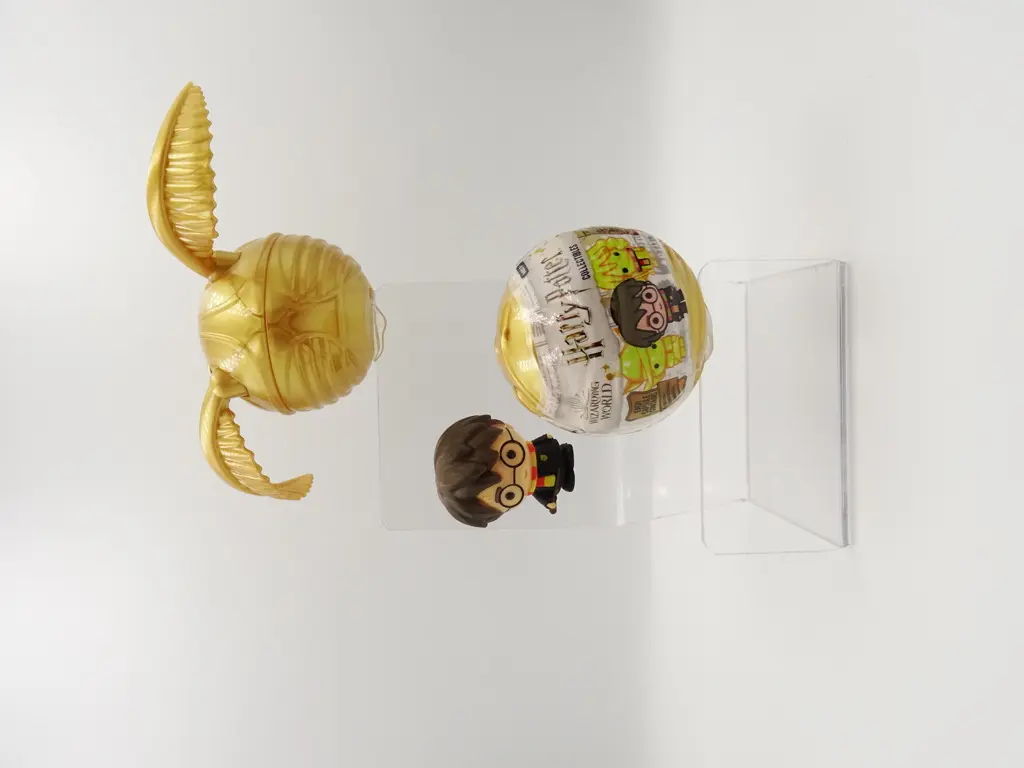 Harry Potter Ozdoba zlatonka s figurkou