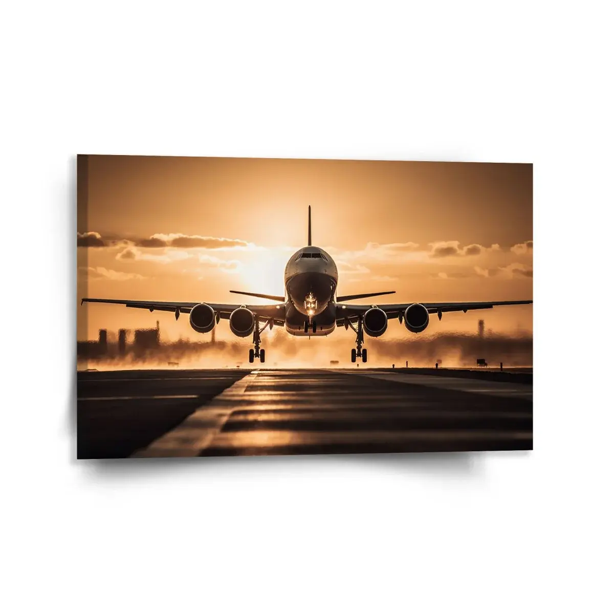 Obraz Letadlo přistávající při západu slunce - 120x80 cm