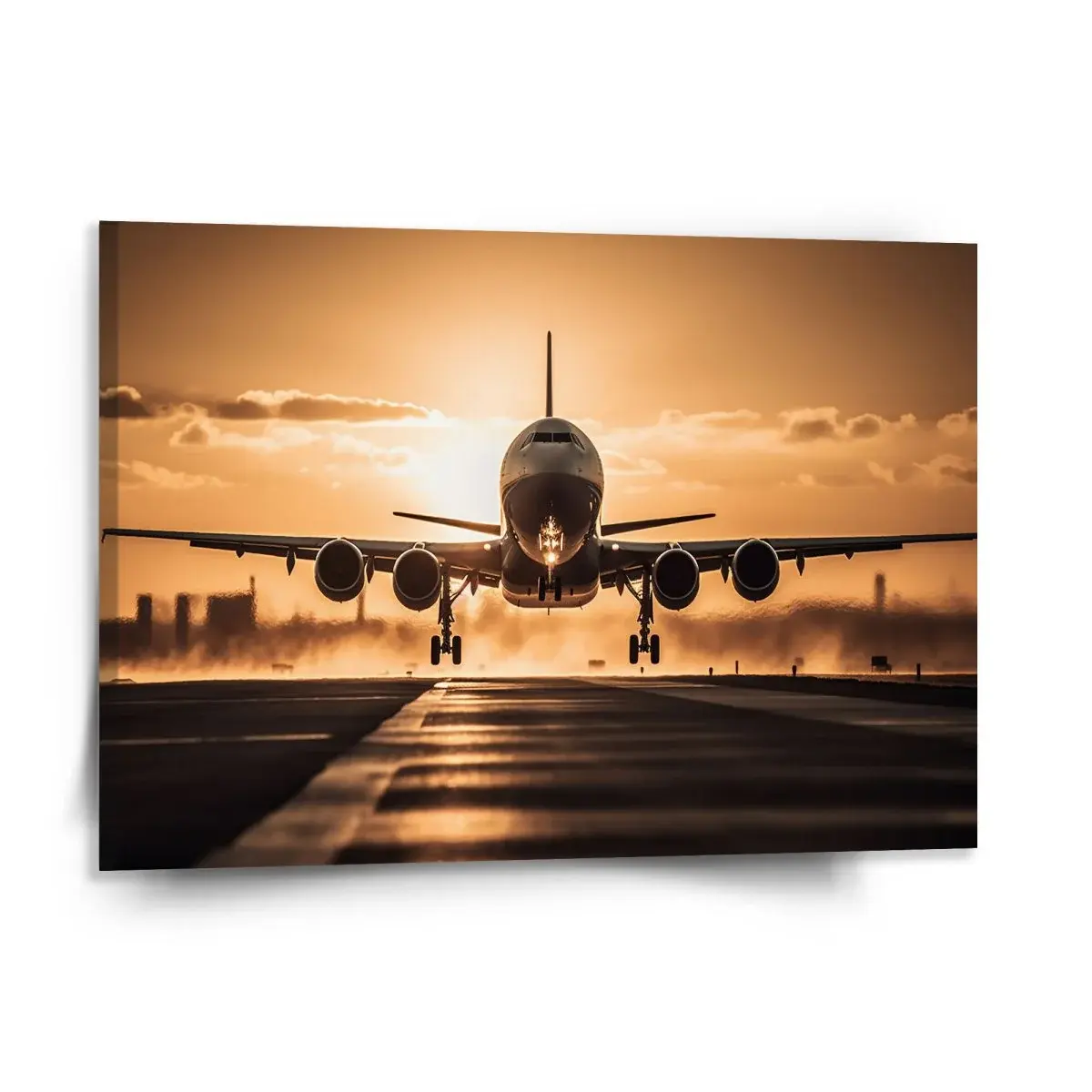 Obraz Letadlo přistávající při západu slunce - 150x110 cm