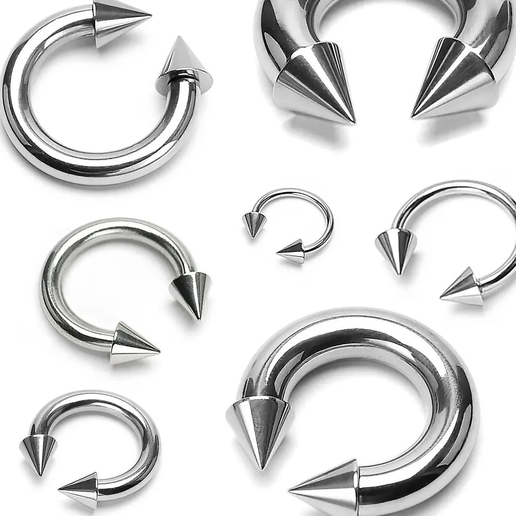 Piercing - podkova s hroty, tl. 1,2 mm (1,2 x