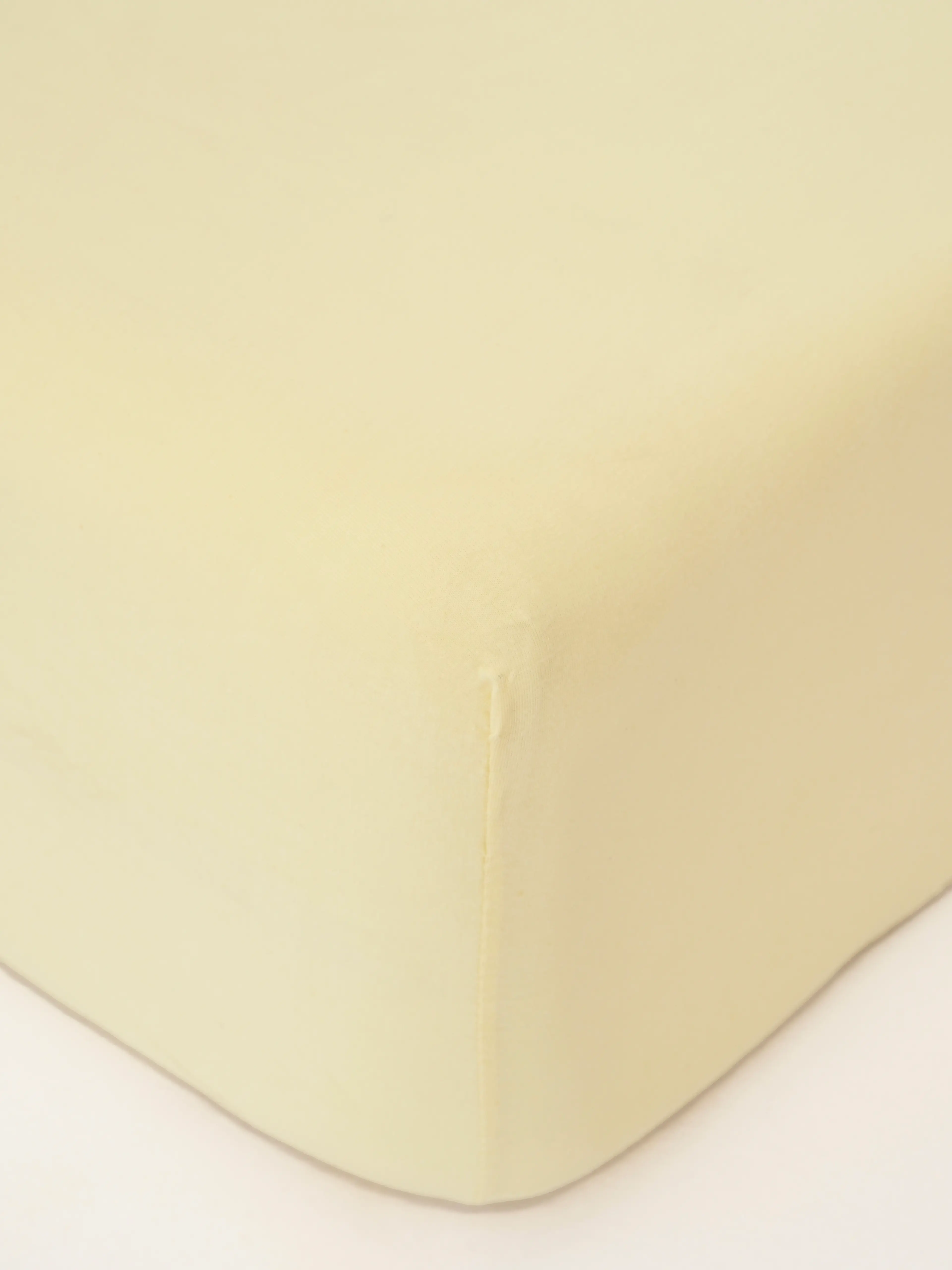 MKLuzkoviny.cz Jersey prostěradlo s elastanem Deluxe 140 × 200 cm – pastelově žlutá