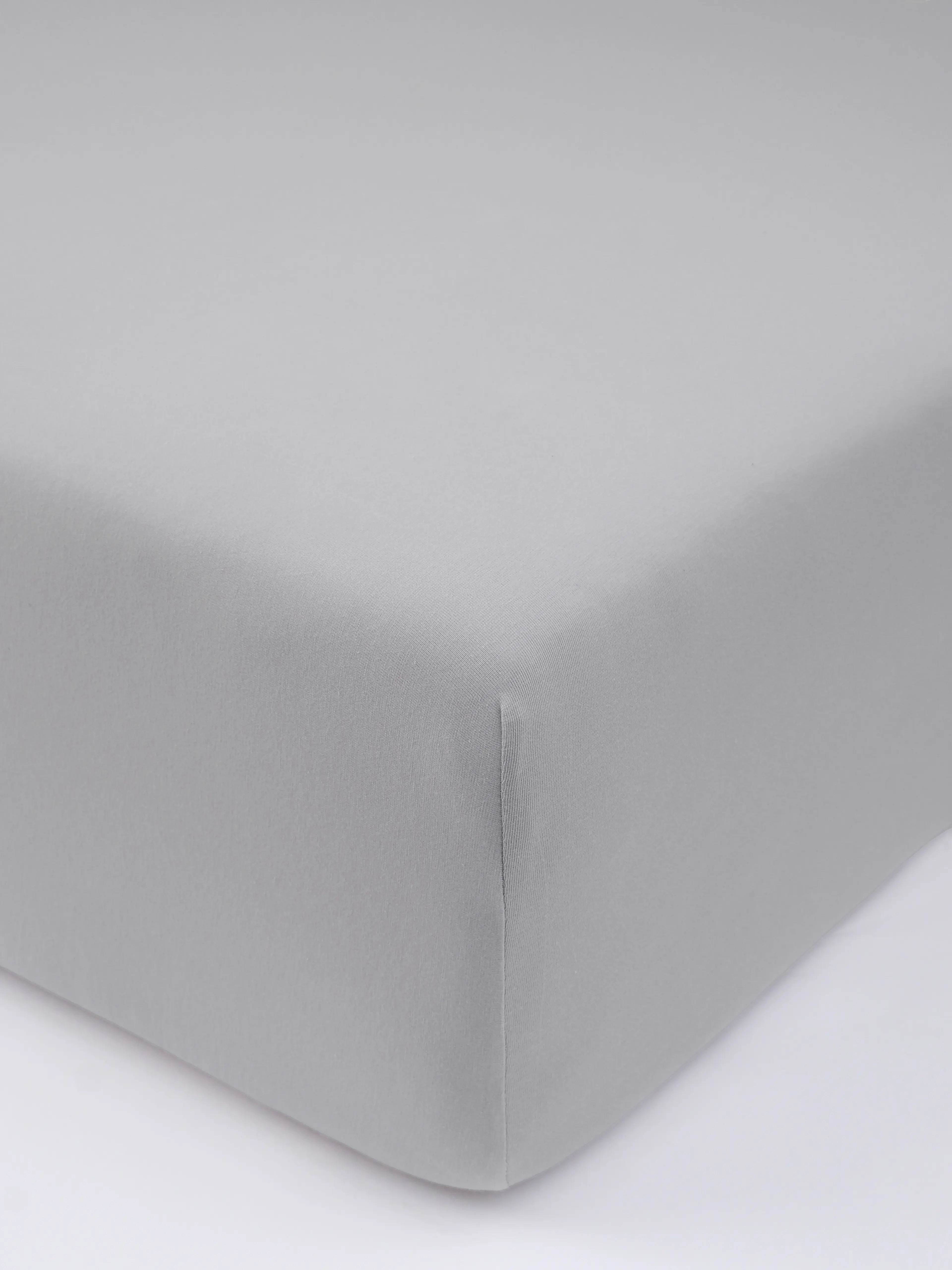 MKLuzkoviny.cz Jersey prostěradlo do postýlky s elastanem Deluxe 60 × 120 cm – světle šedé