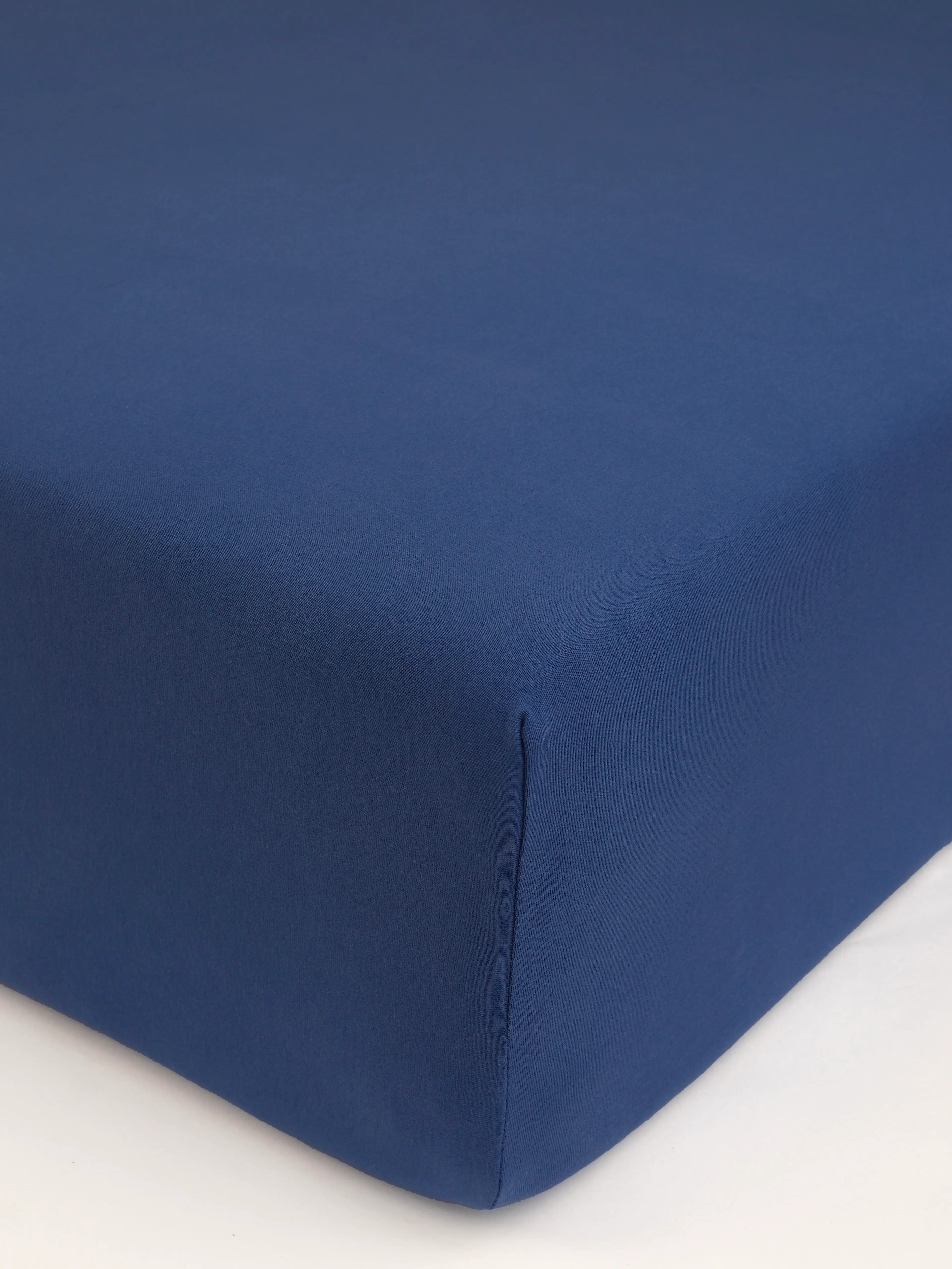 MKLuzkoviny.cz Jersey prostěradlo s elastanem Deluxe 90 × 200 cm – tmavě modré