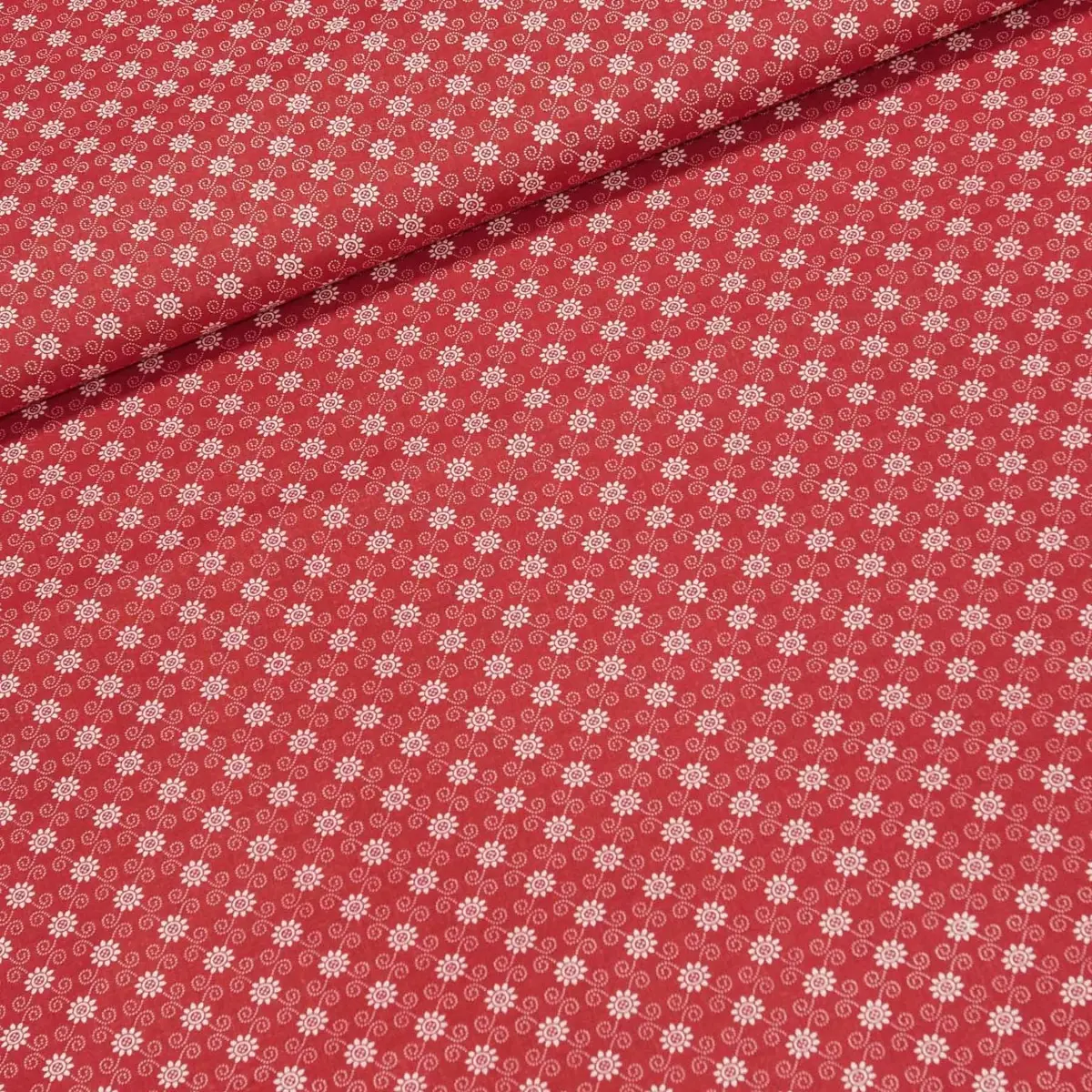 Bavlněné plátno POLO bílý kvítek a spirálky na červené, š.140cm (látka v metráži)