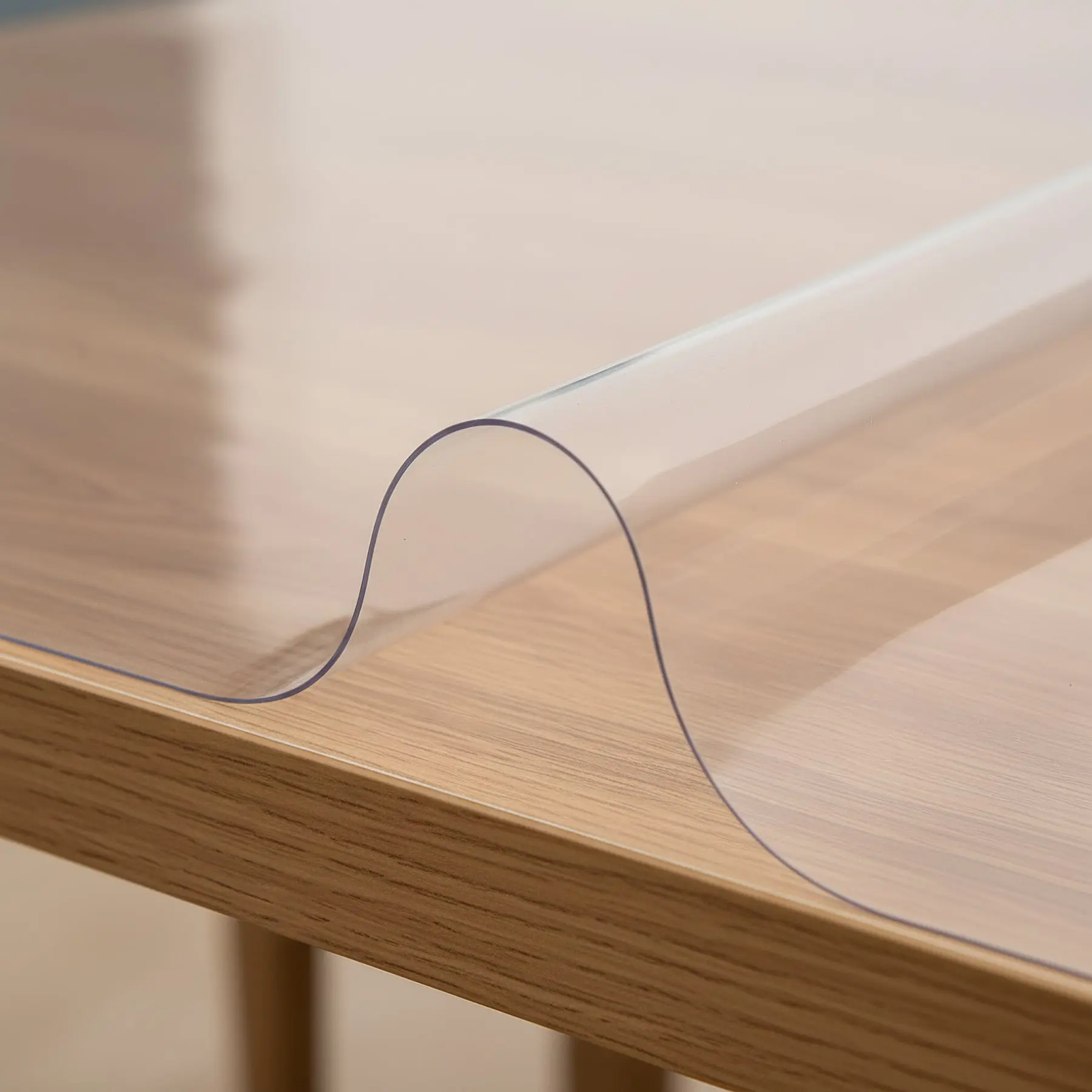 Průhledný ochranný ubrus na stůl z měkčeného PVC (tzv. měkké sklo) tl. 1,2mm, š.90cm (metráž)