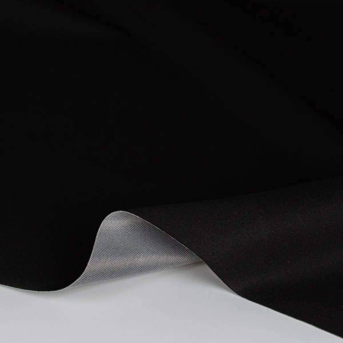TextilCentrum.cz Potahová látka na SLOUPKY / STROPNICI do auta AUTOMOTIVE HEADLINER KOPER MONO 100, TENKÁ černá, tloušťka 1,8 mm, s molitanem a síťkou, š.180cm (látka v metráži)